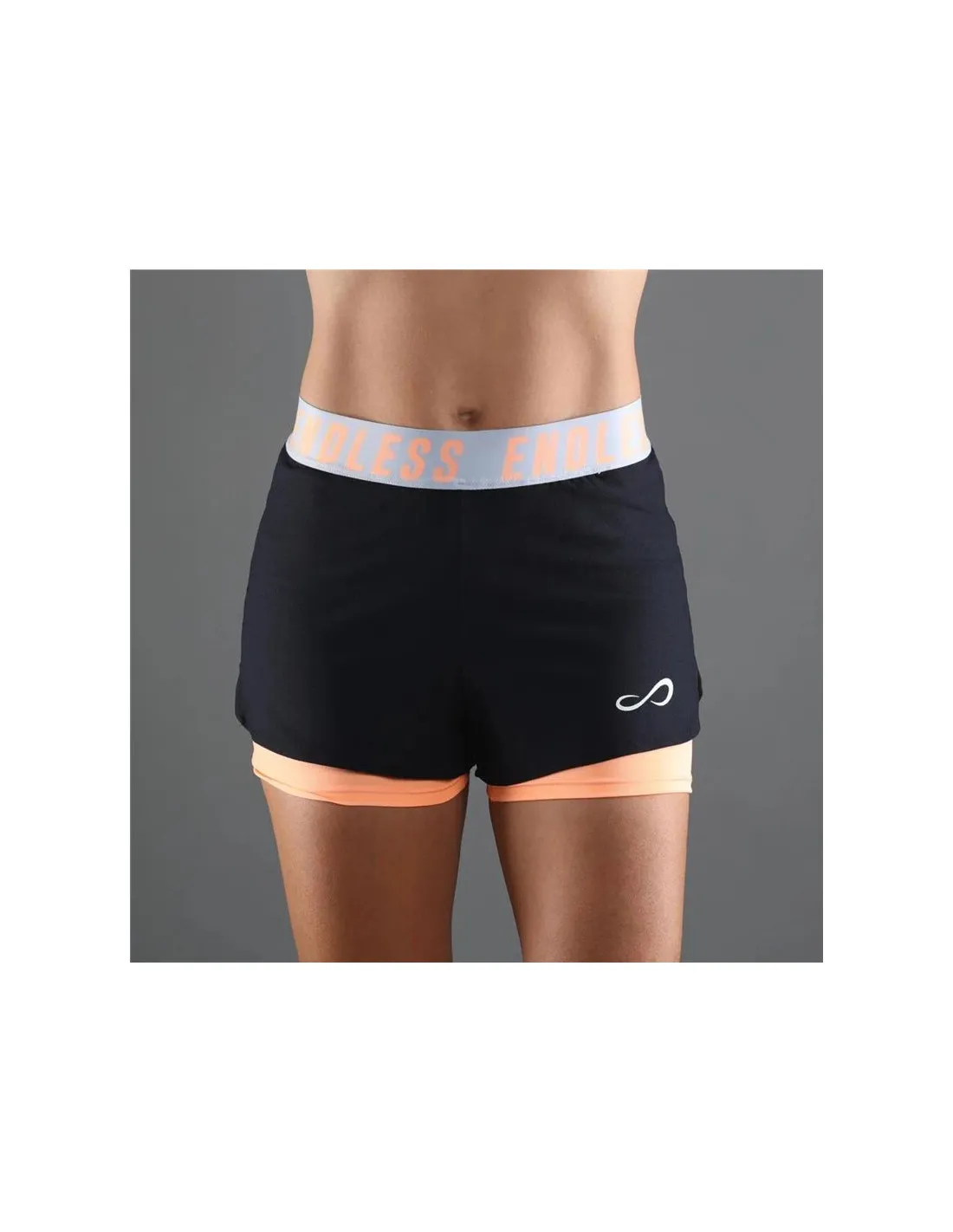 PANTALONES CORTOS DE PáDEL ENDLESS TECH ICONIC MUJER NEGROSALMóN